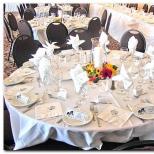 Tables with white tablecloths